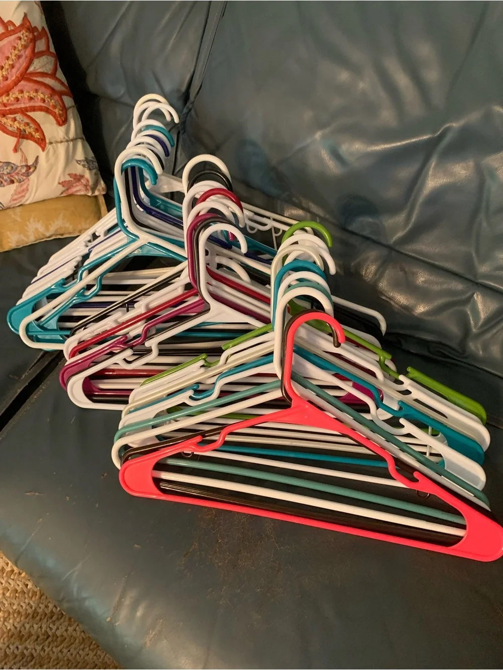 PLASTIC hangers, large assortment of 35, various colors. Approx 16.5 inches wide